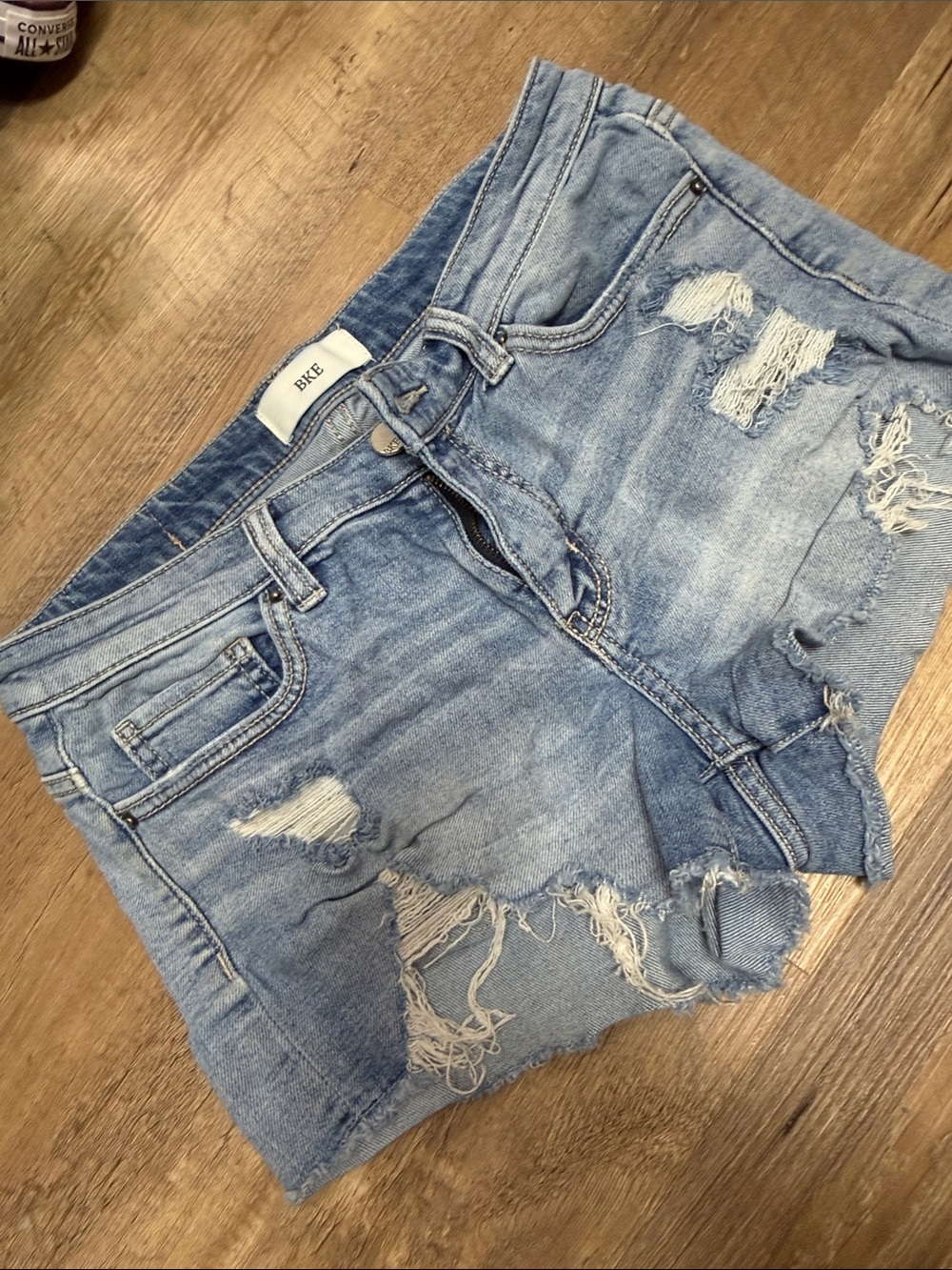 BKE Women's Light Blue Distressed Denim Shorts with Frayed Hem